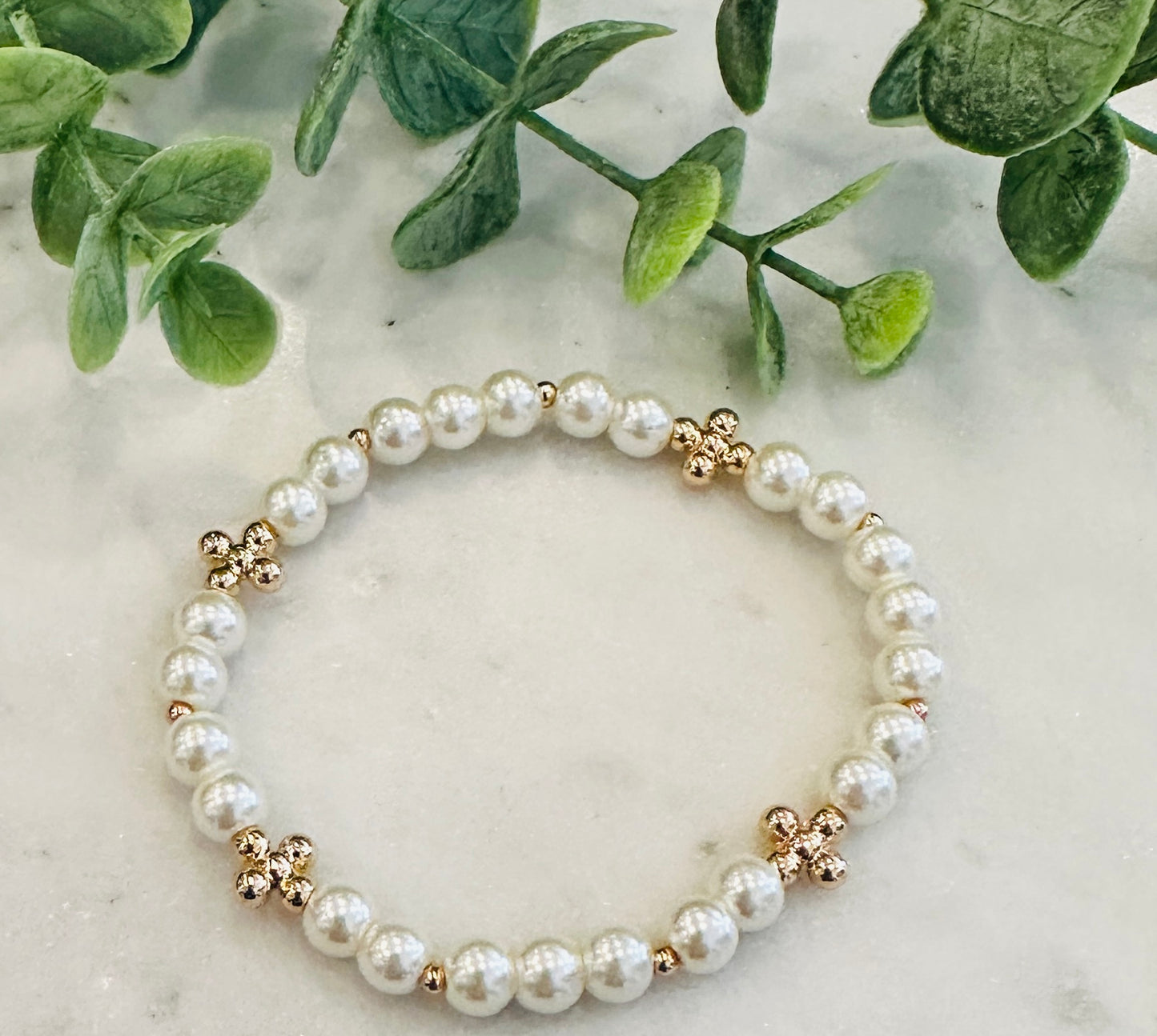 Pearl Stretch Bracelet With Gold Cross