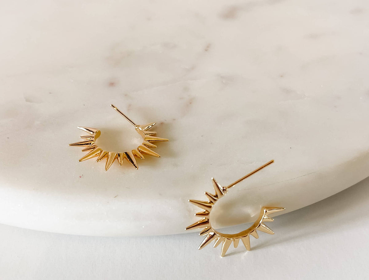 Bella Rey 18K gold plated starburst stud earrings in a radiant sunburst design