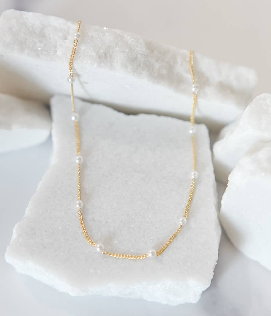 Bella Rey mini pearl beaded chain necklace featuring delicate pearl accents and a polished chain design