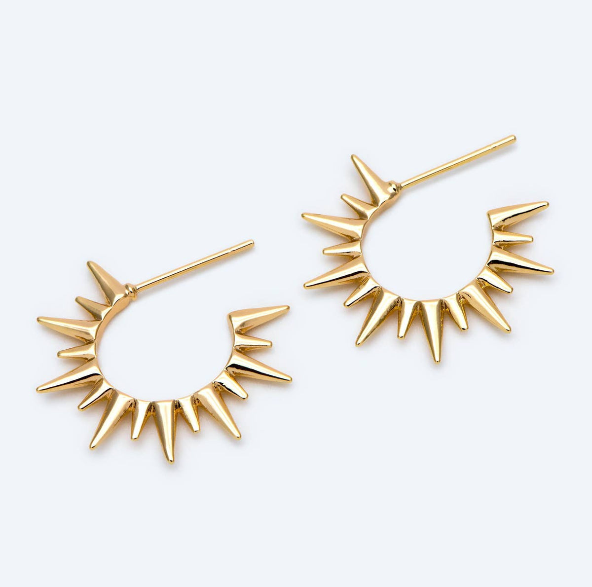 Bella Rey 18K gold plated starburst stud earrings with a radiant sunburst design